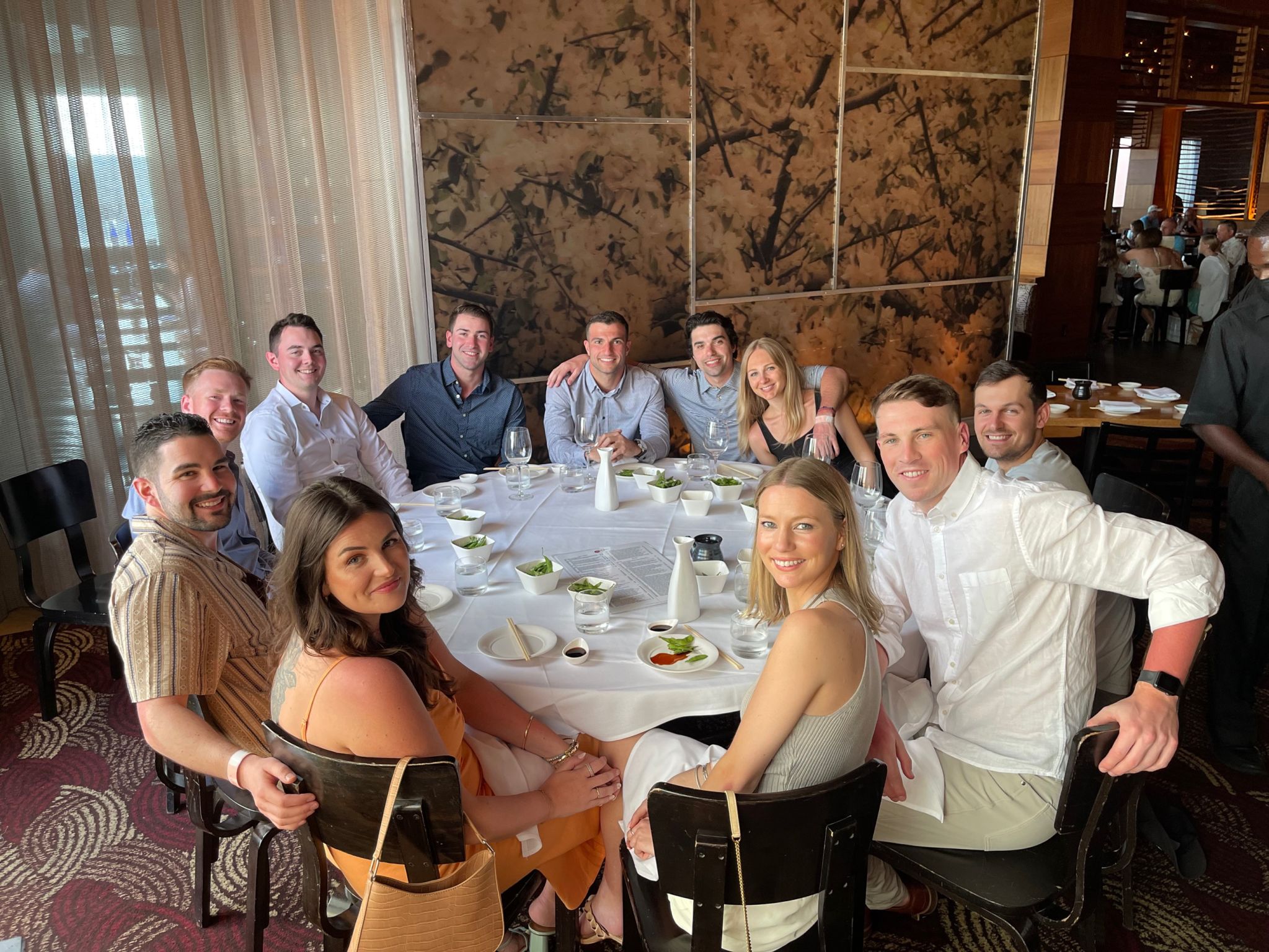 Group of Intentsify employees at team dinner.